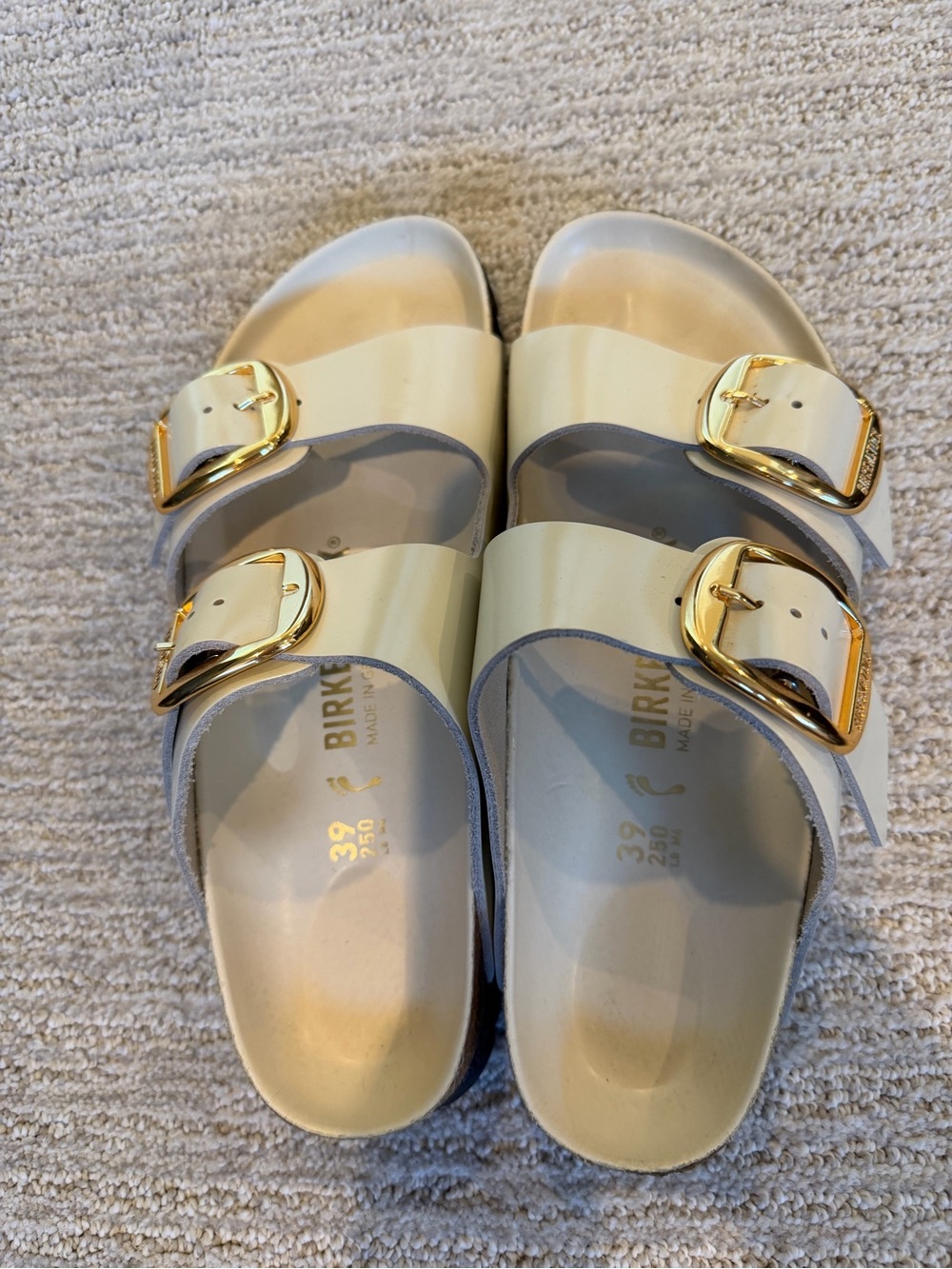 Birkenstock Arizona Sandals in Cream with Gold Buckles